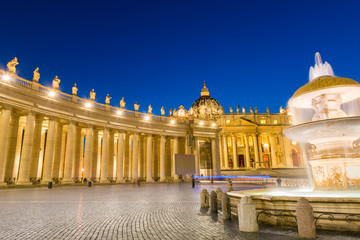 Architecture of the St. Peter's Square and Basilica illuminated at dusk, Vatican City