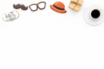 Happy Father Day with hat, glasses, moustache cookies, gift and coffee on white background top view mockup