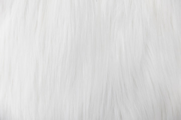 Fototapeta na wymiar close-up of soft beige fluffy fur, wool, carpet texture background.