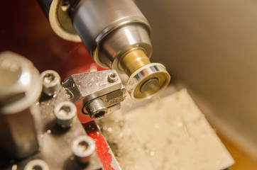 Machining of cylindrical parts on a lathe machine.