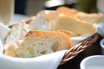 Sliced bread in the basket on the table. Healthy eating concept