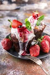 Delicious dessert. Fresh juicy strawberries and ice cream. Close-up. Vertical shot