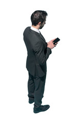 Corporate businessman using a smartphone
