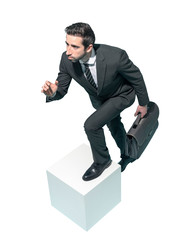 Efficient businessman running with his briefcase