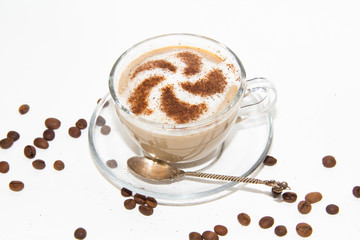 Cappuccino coffee with pattern of cinnamon isolated on white background. Coffee with milk. . Coffee beans