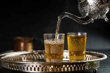 Moroccan tea from popular drinks in the Maghreb - obrazy, fototapety, plakaty