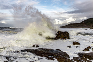 waves crashing on rocks