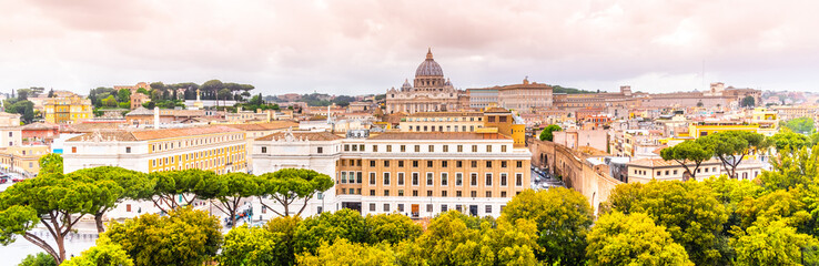 Fototapeta na wymiar Vatican City with St. Peter's Basilica. Panoramic skyline view from Castel Sant'Angelo, Rome, Italy