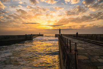 Colorful sunset over Felgueiras Lighthouse and the Atlantic Ocean, in Porto