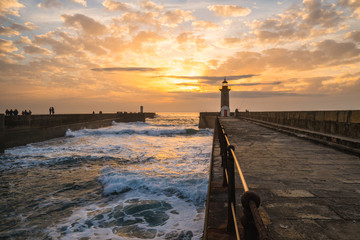 Colorful sunset over Felgueiras Lighthouse and the Atlantic Ocean, in Porto