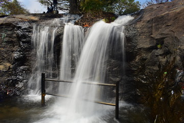 Fototapeta na wymiar Kumbakkarai Water Falls in the foothills of the Kodaikanal Hills