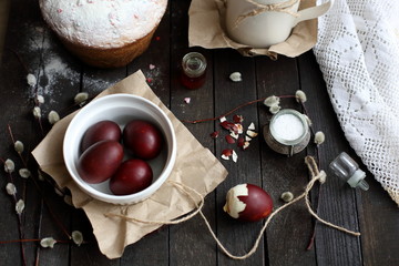 Easter still life with cake on a dark wooden background