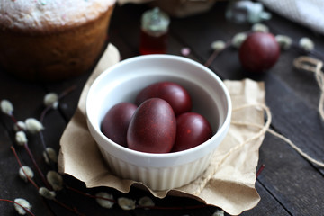 Easter still life with cake on a dark wooden background
