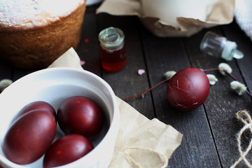 Easter still life with cake on a dark wooden background