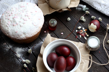 Easter still life with cake on a dark wooden background