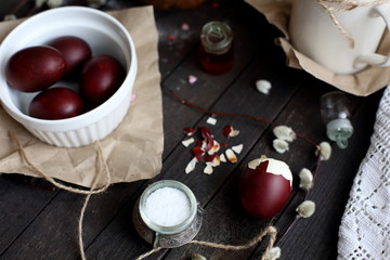 Easter still life with cake on a dark wooden background