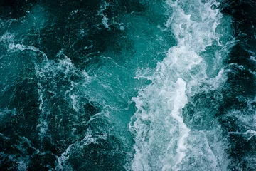 Abstrakter Wasserozeanwellen-Texturhintergrund. © Tavan