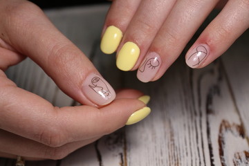 Fashionable yellow manicure
