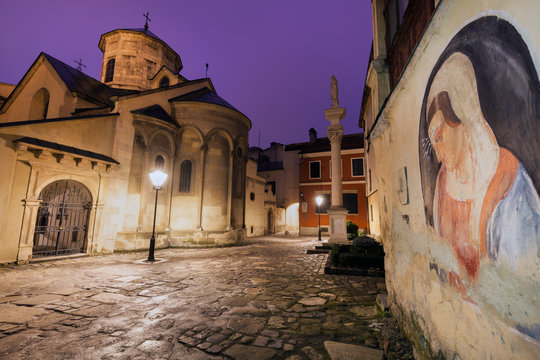 Mural of Virgin Mary by Armenian Cathedral at night in Lviv, Ukraine