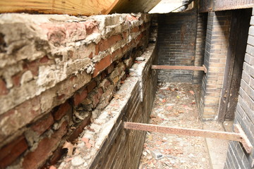 Fototapeta na wymiar old brick retaining wall