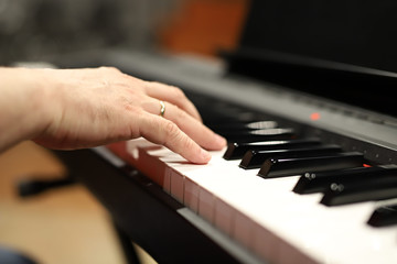 Fototapeta premium hands playing piano