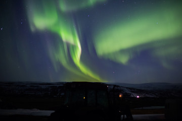 Northern lights with tractor