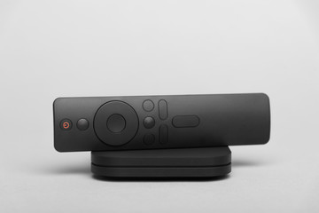 TV set-top box for ip tv and digital video content on a gray background. Digital TV on gray...