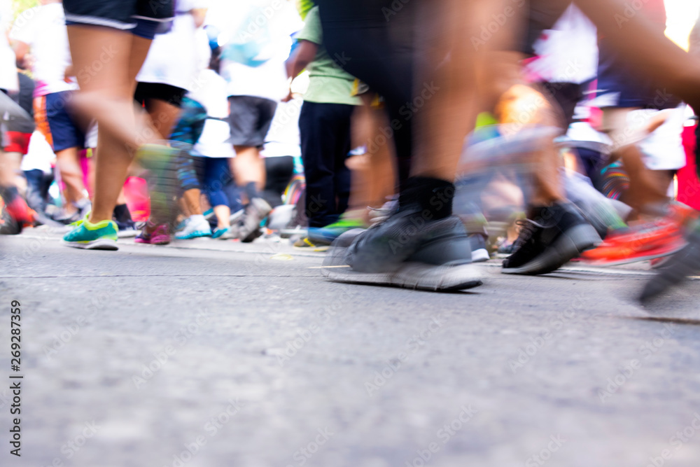 Wall mural carrera marathon detail legs, movement, competition in latin america, latina people brown skin