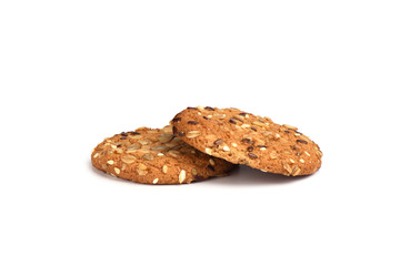 Oatmeal cookies with cereals isolated on white background. Sweet dessert.