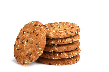 Oatmeal cookies with cereals isolated on white background. Sweet dessert.