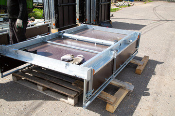 Open car trailer. Trailer store. Assembly of car trailers.