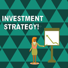 Writing note showing Investment Strategy. Business concept for the systematic plan to allocate investable assets Woman Holding Stick Pointing to Chart of Arrow on Whiteboard