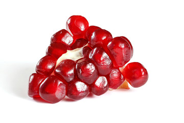 Cluster of gem like pomegranate fruit isolated on white background