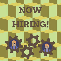 Word writing text Now Hiring. Business photo showcasing finding evaluating working relationship with future employees Two Business People Each Inside Colorful Cog Wheel Gears for Teamwork Event