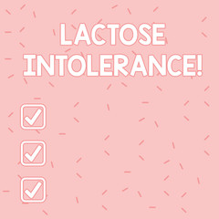 Text sign showing Lactose Intolerance. Business photo text digestive problem where body is unable to digest lactose Pink Tiny Sprinkles Confetti Scattered in Random on Lighter Shade Backdrop