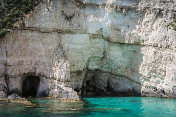 Turquoise water under Blue Caves
