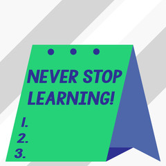 Writing note showing Never Stop Learning. Business concept for keep on studying gaining new knowledge or materials