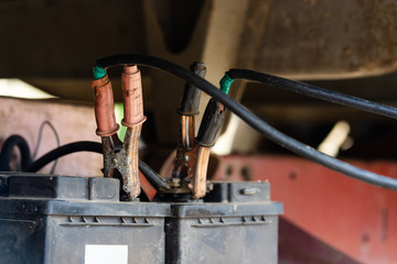 Charging truck batteries using jumper cables jump start engine booster cables