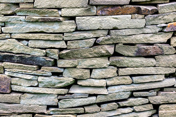 Pattern gray color of modern style design decorative uneven cracked real stone wall surface