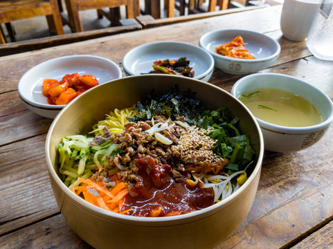 Traditional Korean bibimbap, a dish of rice, meat and vegetables, served in a hot stone bowl, in the town of Jeonju in South Korea