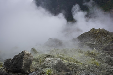 view of crater on active mountain with sulfur gas come out from stone. Beautiful landscape of mount Papandayan. Papandayan Mountain is one of the favorite place to hike on Garut.