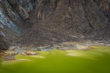 Small sulfur lake on active mountain. Beautiful landscape of mount Papandayan. Papandayan Mountain is one of the favorite place to hike on Garut.