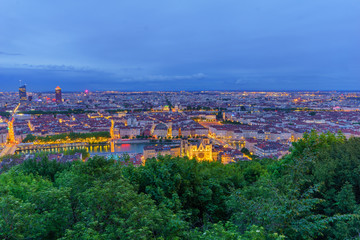 Obraz premium Saint-Jean cathedral, Saone and city center, at evening, in Lyon