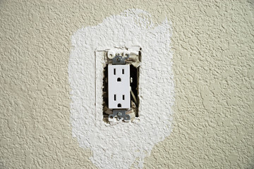 Wall Outlet Being Painted
