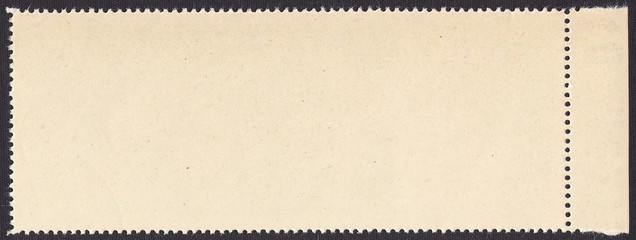 The reverse side of postage stamps with adhesive.