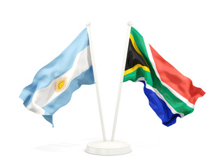 Two waving flags of Argentina and south africa isolated on white