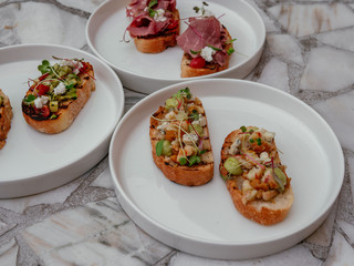 Delicious bruschetta with a variety of fillings.