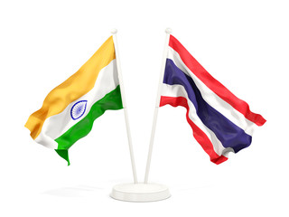 Two waving flags of India and thailand isolated on white