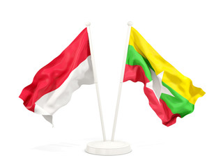 Two waving flags of Indonesia and myanmar isolated on white