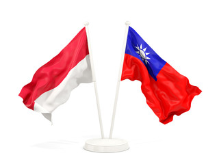 Two waving flags of Indonesia and Taiwan isolated on white